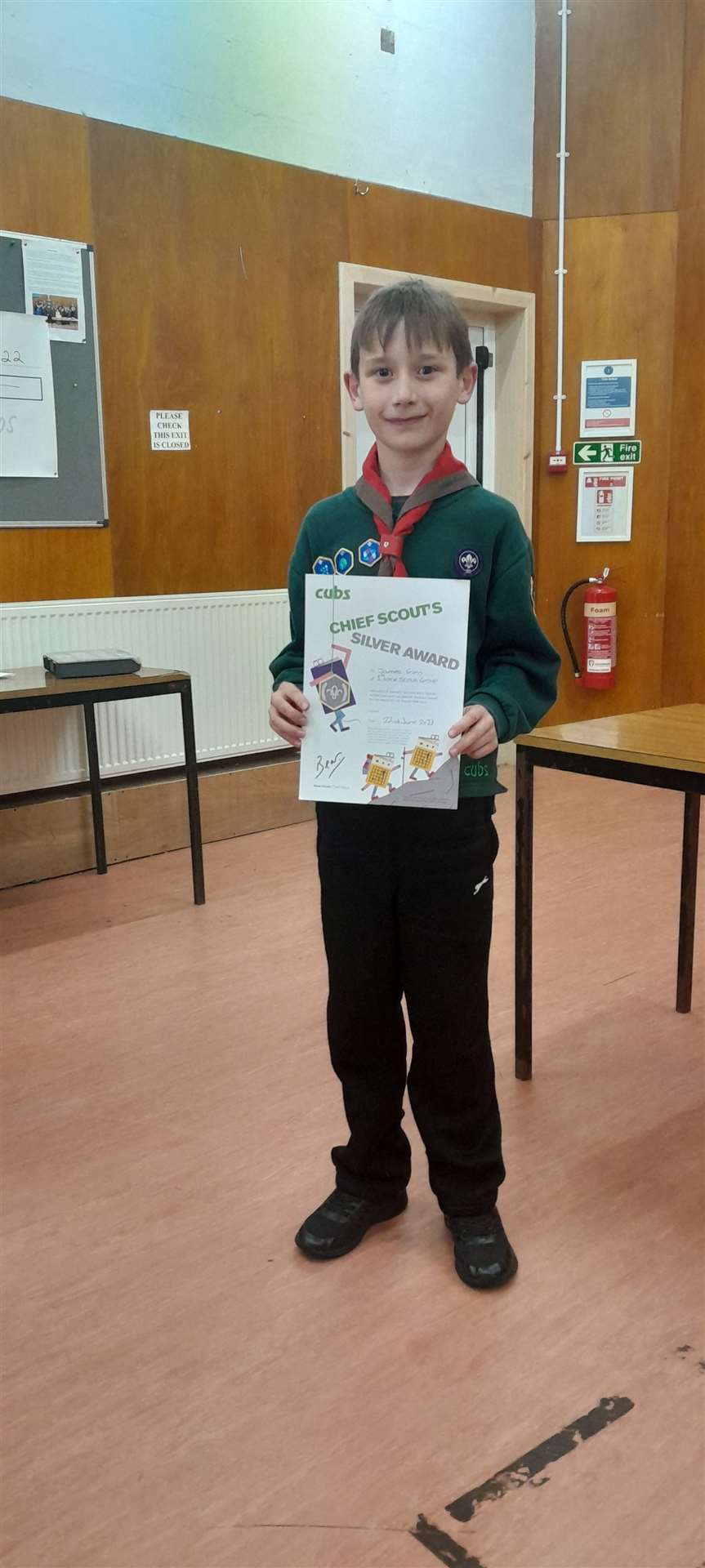 James Gunn of 1st Wick Cub Scouts with his Chief Scout Silver Award certificate.