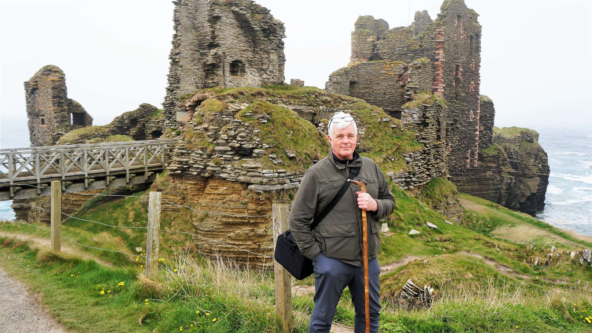 Author Shawn Williamson, who wrote Questus, outside the ruins of the iconic Caithness castle that features in his book. Picture: DGS