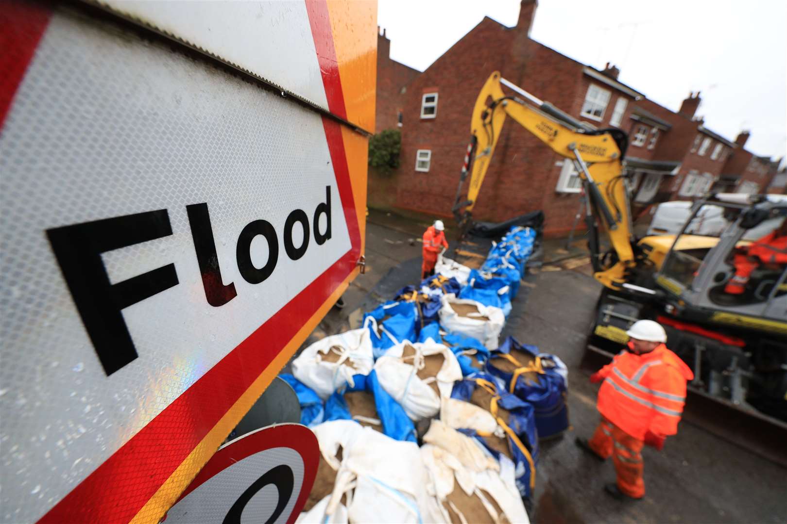Workmen prepare flood defences near the River Ouse, York, as Storm Christoph is set to bring widespread flooding, gales and snow to parts of the UK (Danny Lawson/PA)