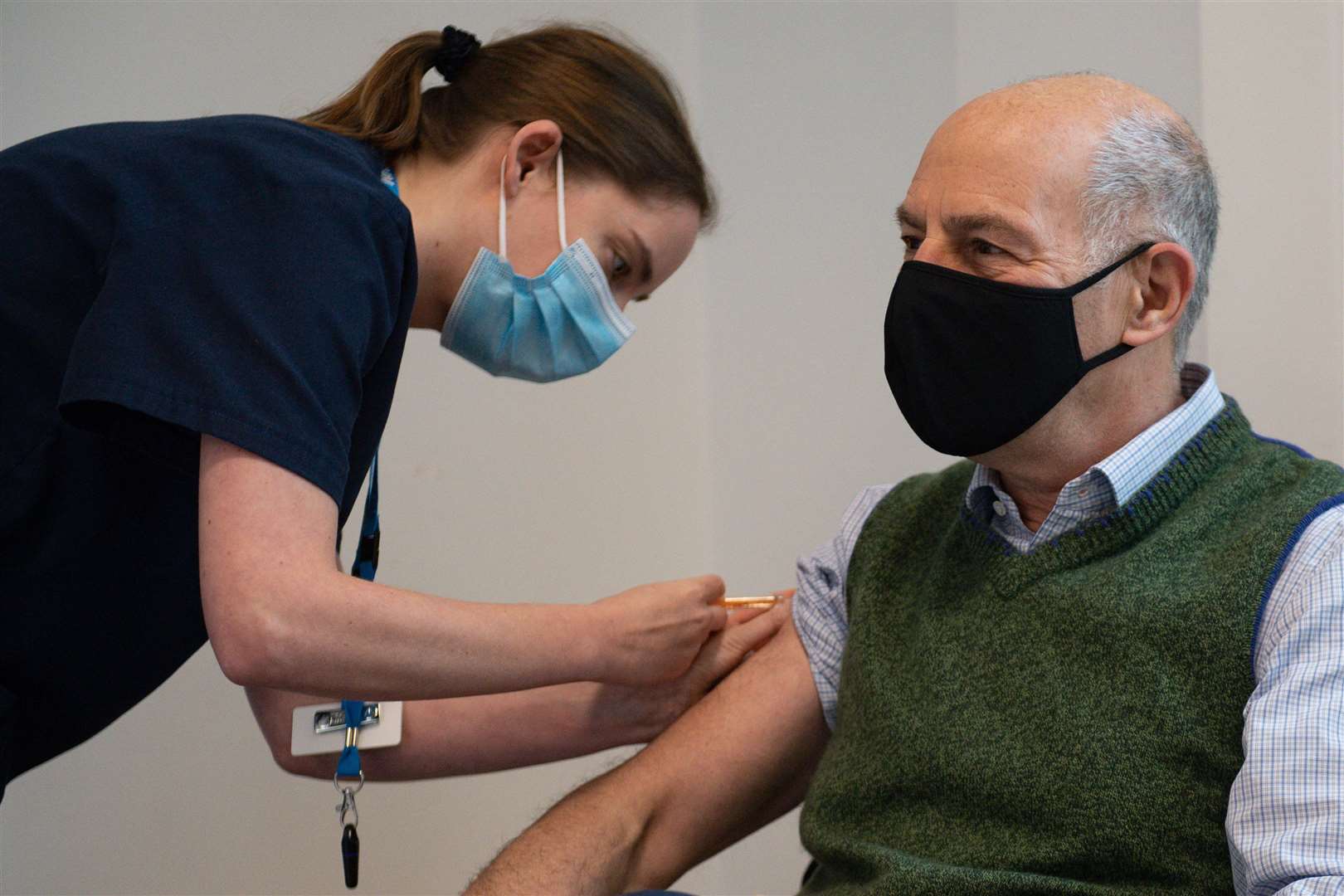 Broadcaster and author Loyd Grossman, 70, receives an injection of the Oxford AstraZeneca Covid-19 vaccine (Jacob King/PA)