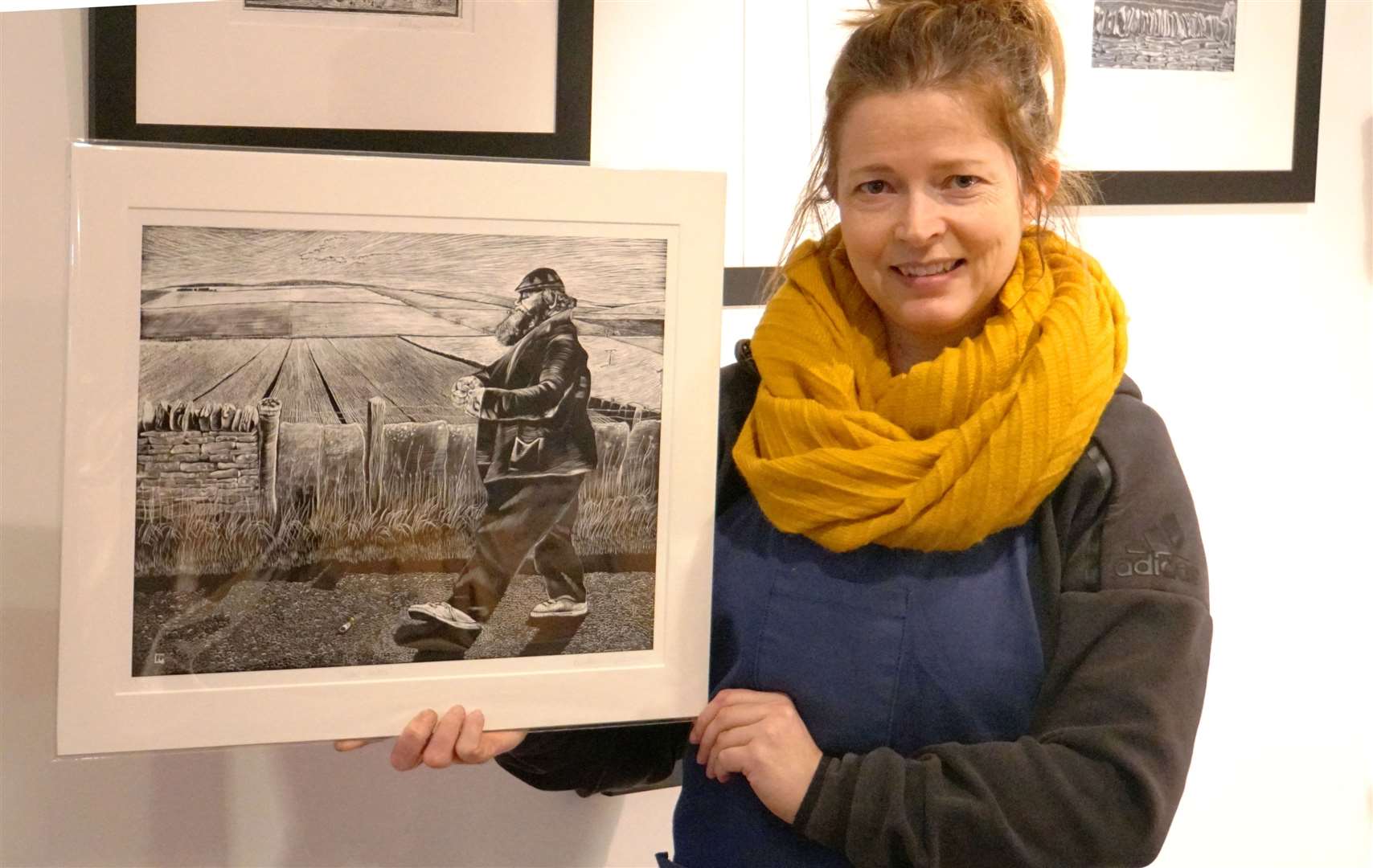 Lindsey shows a recent work portraying late Thurso character "Doupy Dan" currently on show at The Art Gallery in Thurso Library.