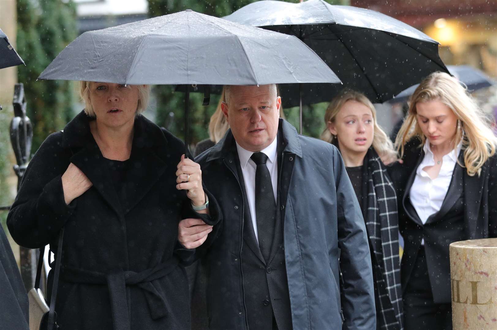 Jack Merritt’s parents Anne and David, left, and girlfriend Leanne O’Brien, centre (Aaron Chown/PA)