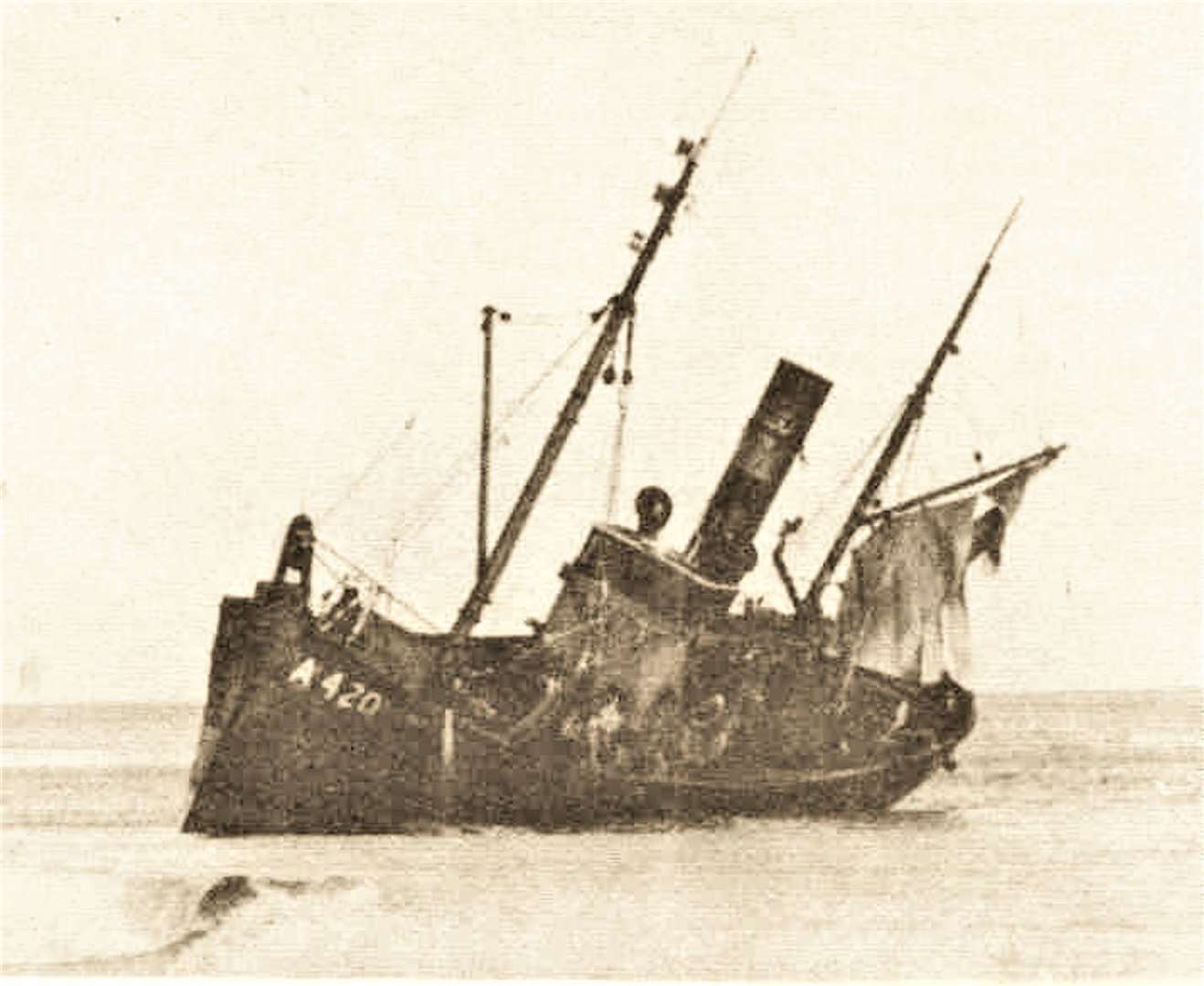 The Jean Stephen pictured the day after she was driven on to Reiss beach during a storm in January 1958.