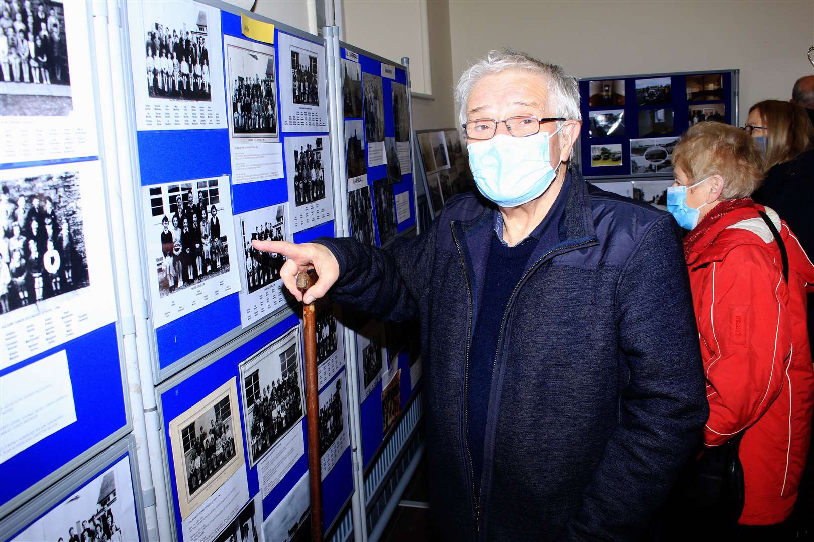 George Manson pointing to one of the school photos from yesteryear. Picture: Alan Hendry