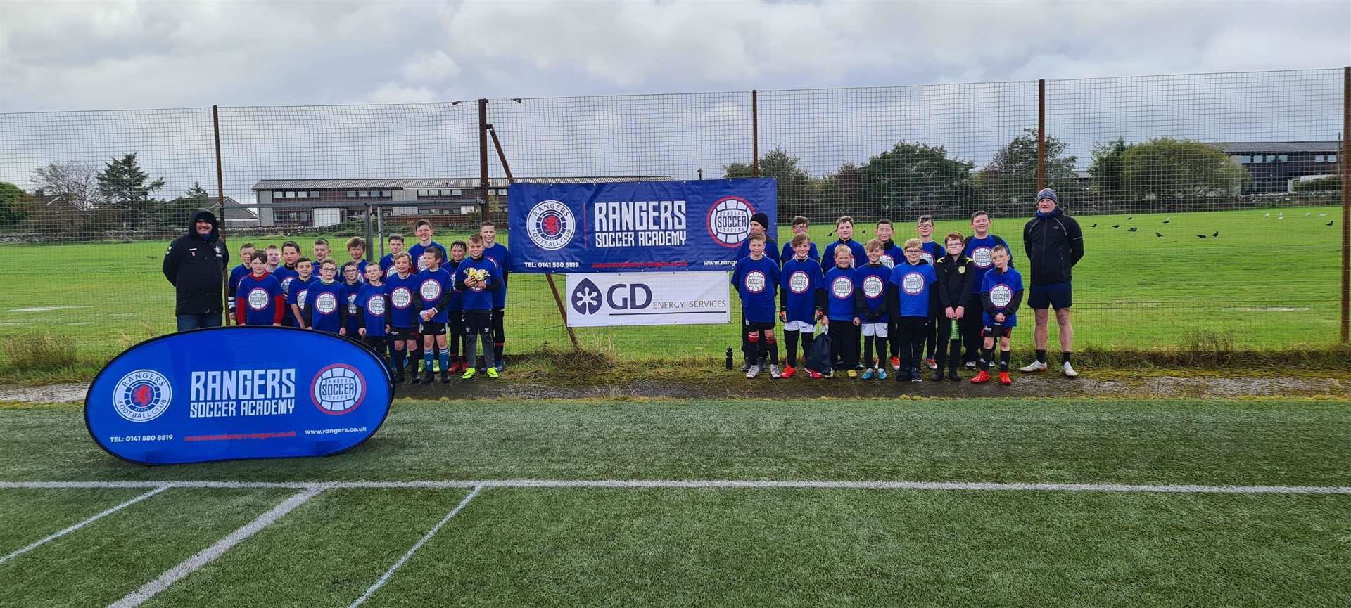 Derek Johnstone and Colin Hendry with youngsters in the 9-14 group.