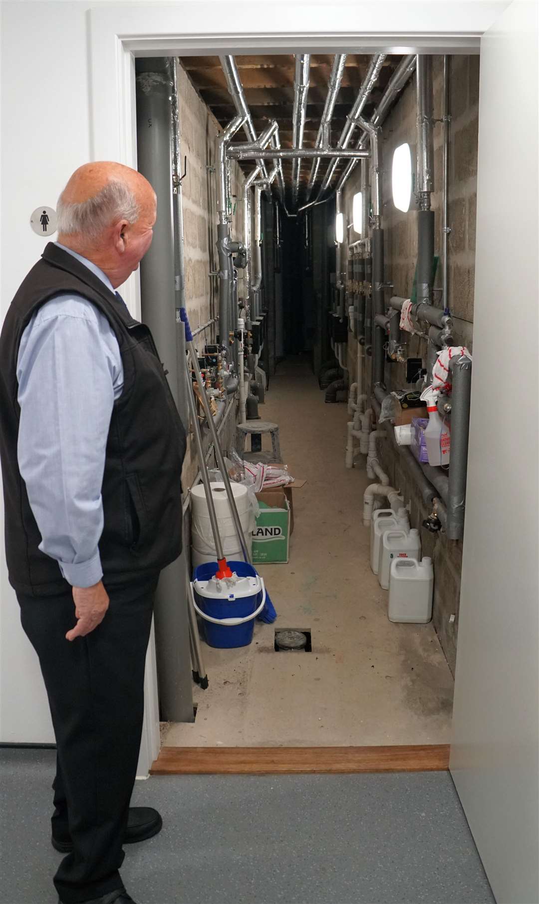 Cllr Willie Mackay surveys the guts of the facility with its hi-tech plumbing. Picture: DGS
