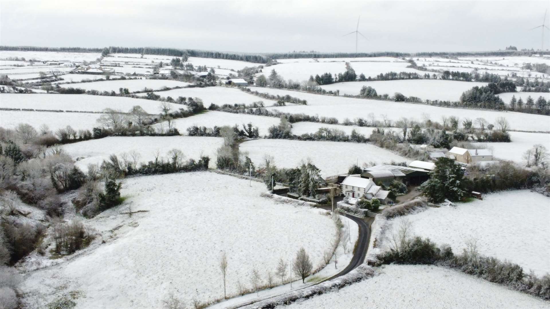 Snow blankets the townland of Ardateggle in County Laois in the Republic of Ireland, as a cold front passes over the UK and Ireland (Niall Carson/PA)