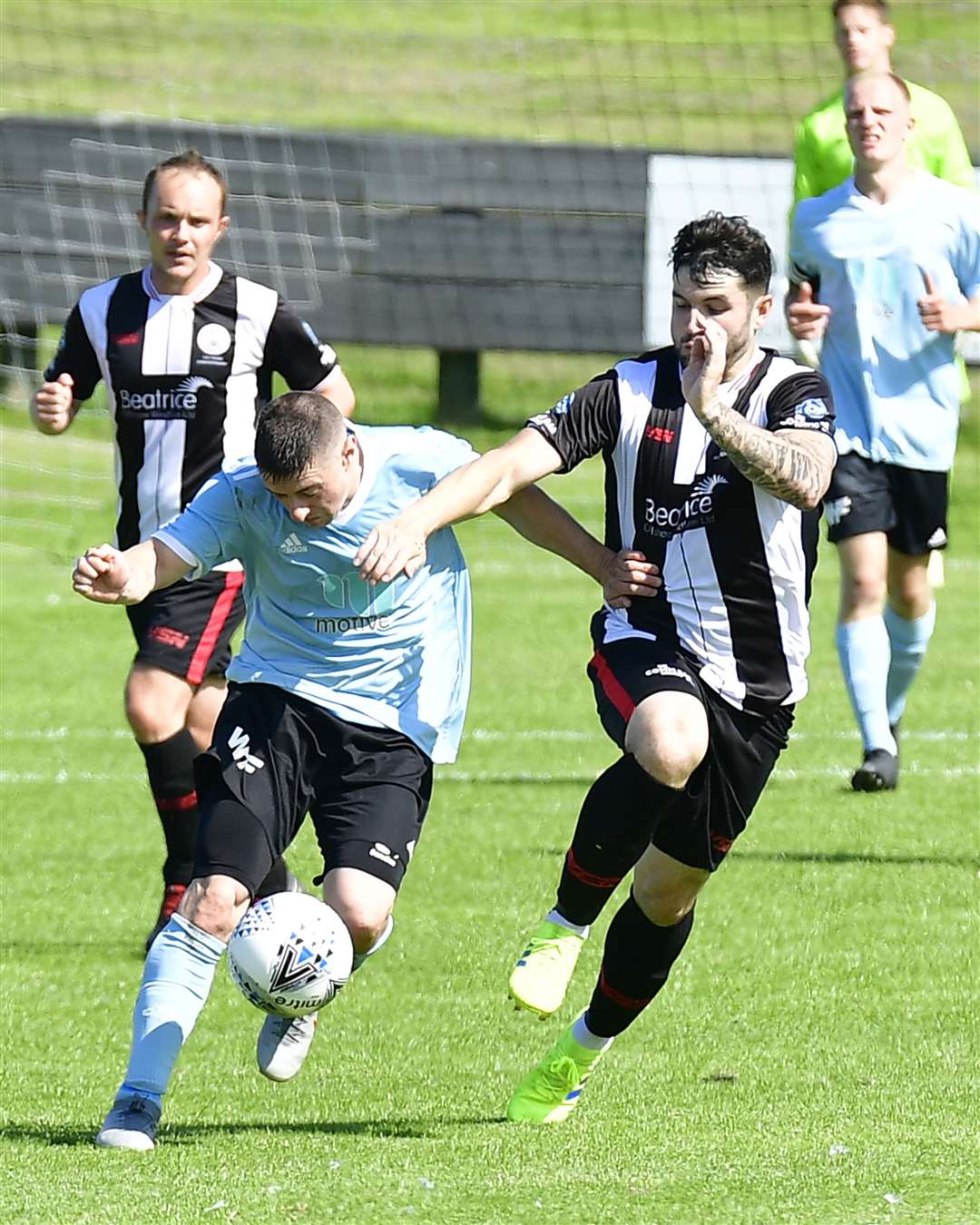 Academy's Sam Mackay and Deveronvale's Ross Archibald in a race for ball on Saturday. Manager Tom McKenna praised Mackay for his 'exceptional' display in midfield. Picture: Mel Roger