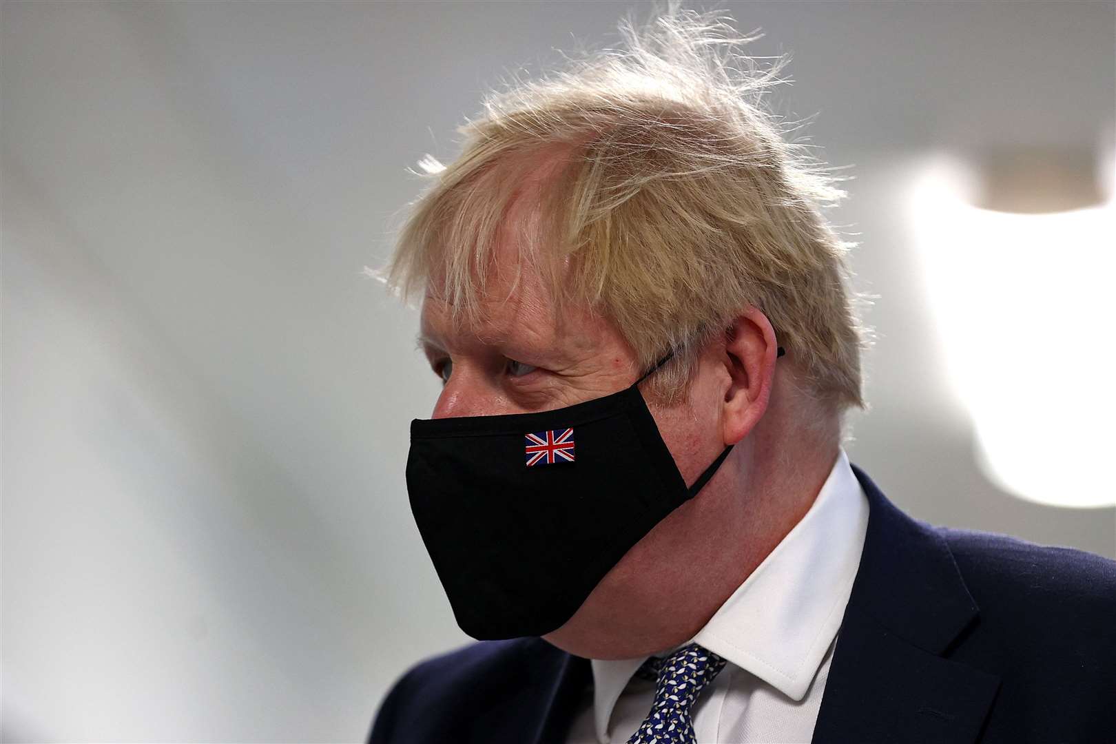 Boris Johnson wears a face mask during a visit to Milton Keynes University Hospital (Adrian Dennis/PA)