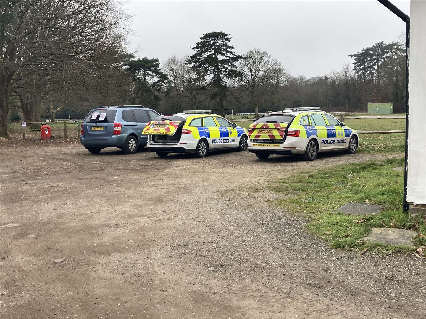 Sussex Police dog unit vehicles at Slindon Cricket Club (Katie Boyden/PA)