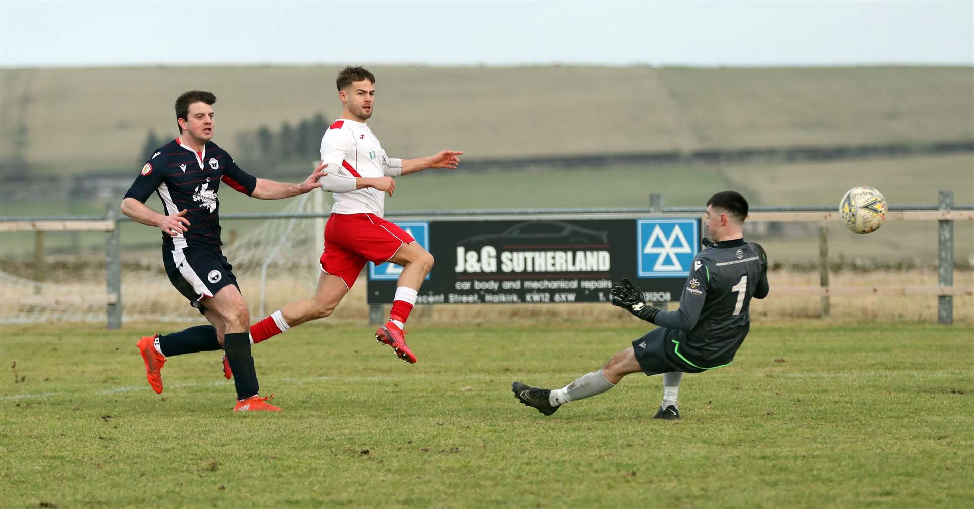 Jonah Martens beats Inverness Athletic keeper Scott Fraser to send Halkirk United through in the North Caledonian Cup. Picture: James Gunn