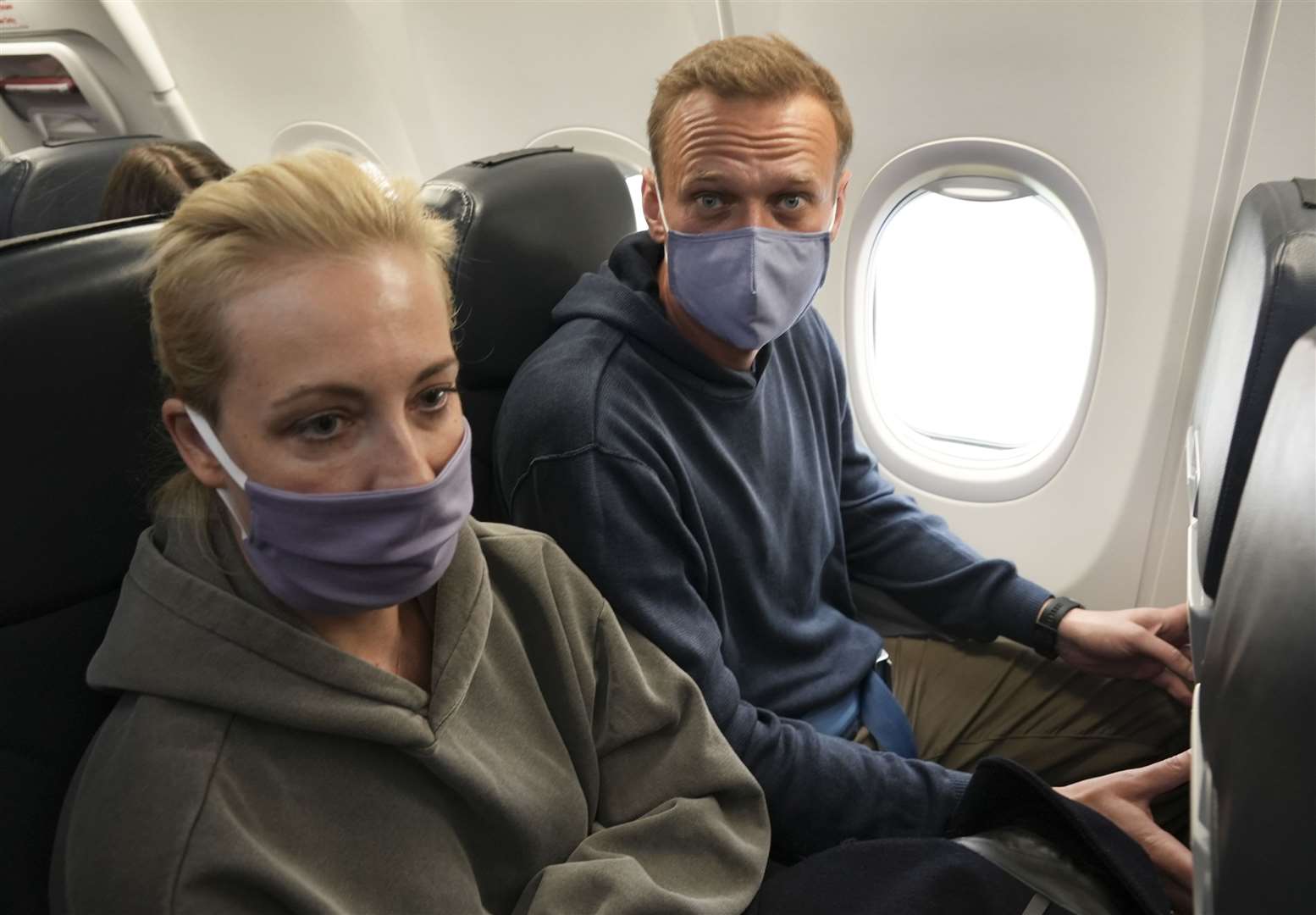 Alexei Navalny and his wife Yulia on the plane to Moscow (Mstyslav Chernov/AP)