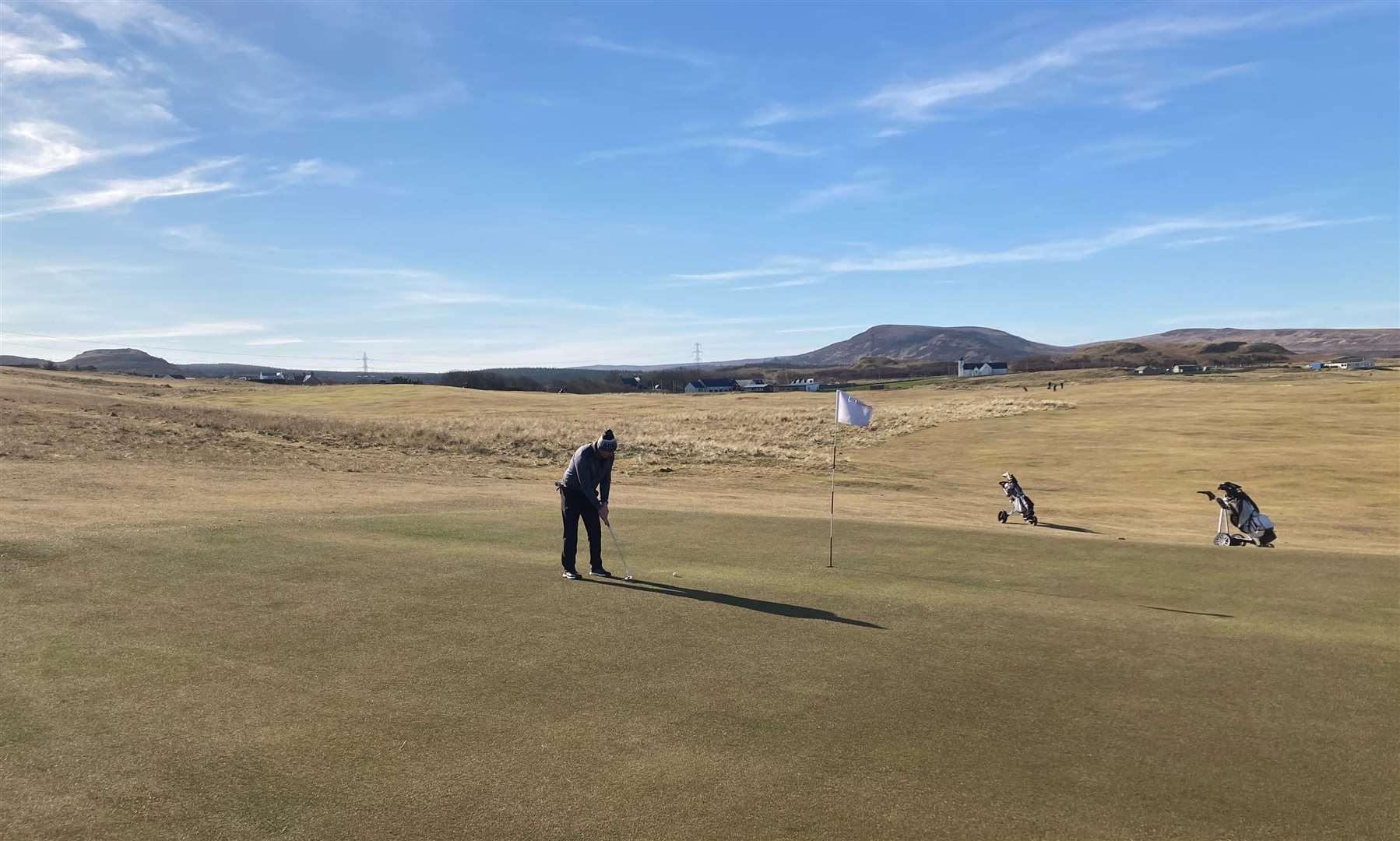 Cammie Ross putting at the eighth green during round 19 of Reay Golf Club's Winter League Stableford at the weekend.