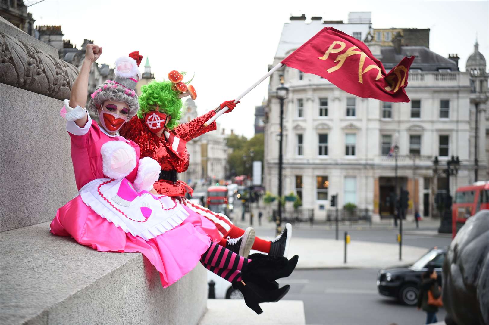 Pantomime dames in Trafalgar Square (Kirsty O’Connor/PA)