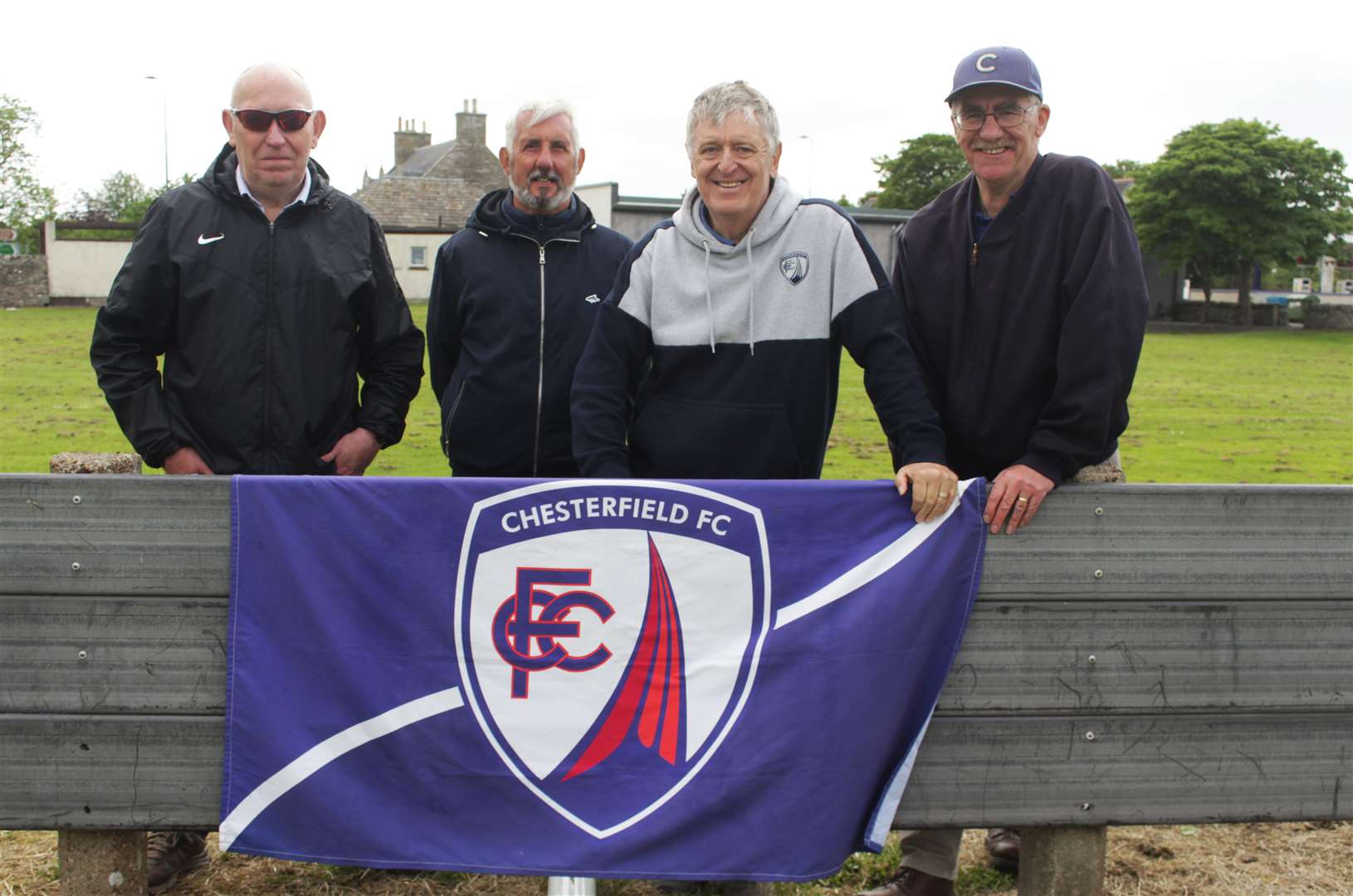 The supporters at the Dammies with their Chesterfield FC flag – (from left) Bruce Baskerville, Phil Smith, Chris Roberts and John Taylor. Picture: Alan Hendry