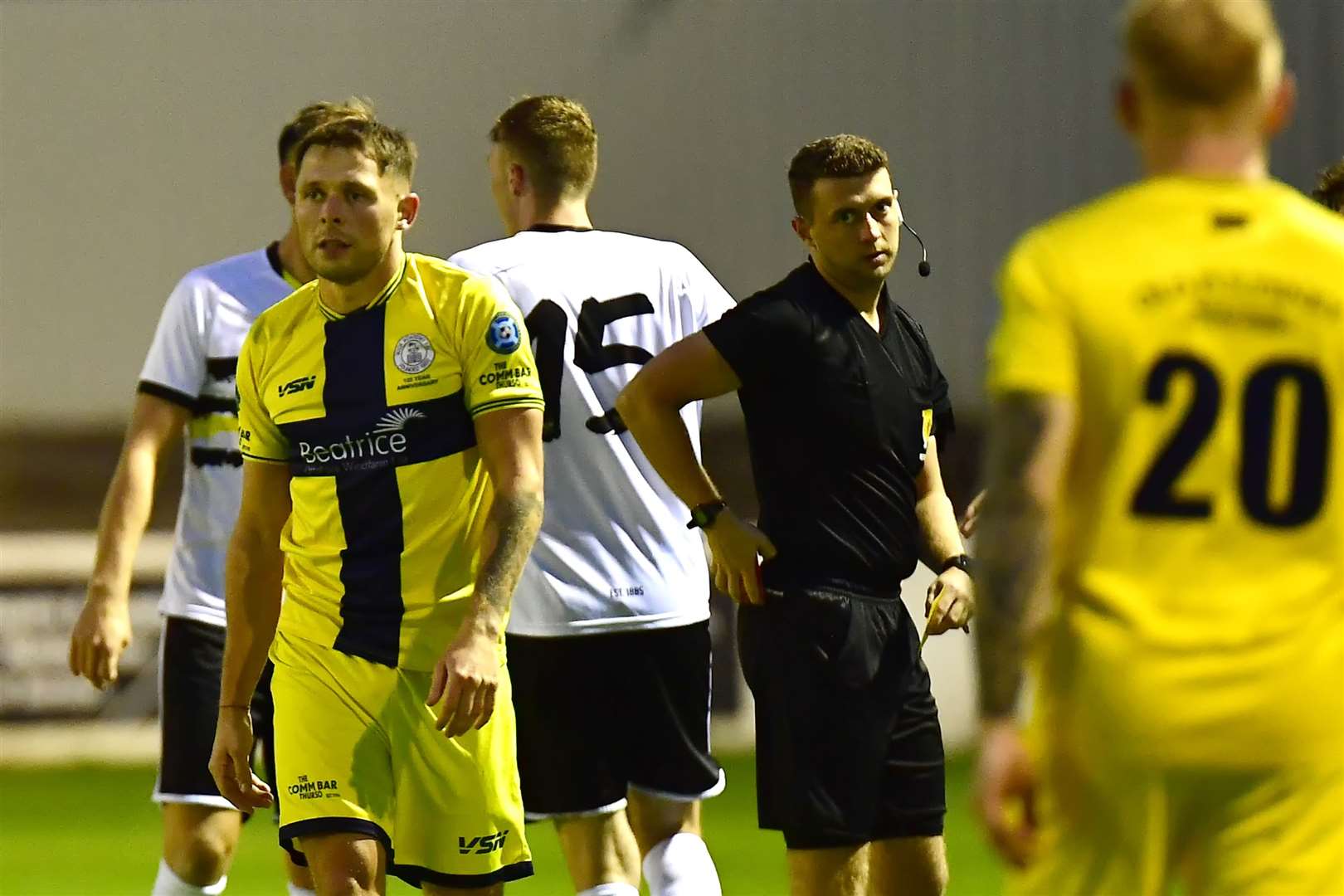 Wick Academy's Jack Henry walks off after receiving a second yellow card from referee David Alexander. Picture: Mel Roger