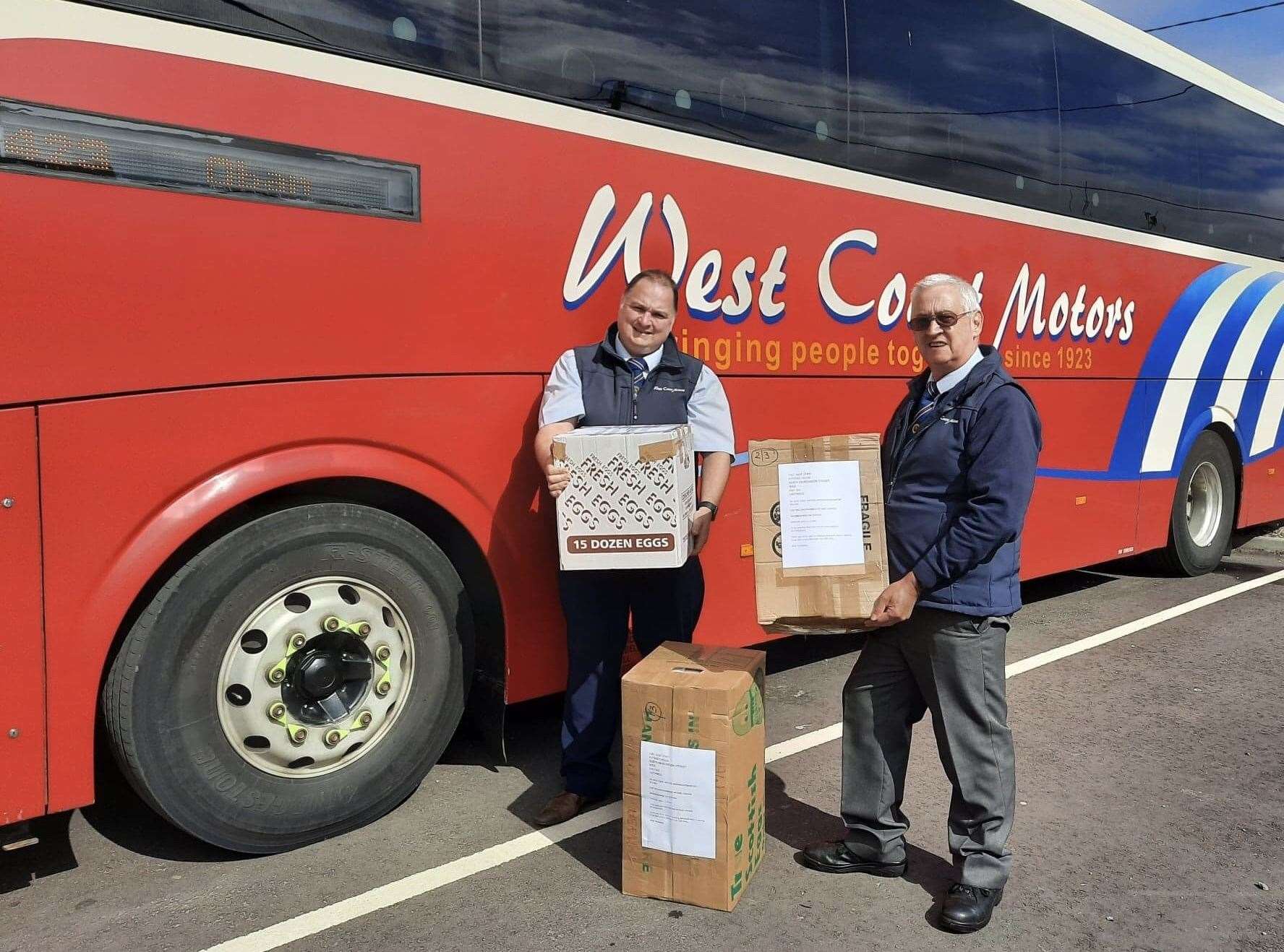 Robert Mackay (left), operations manager at West Coast Motors, with his father Robert who took the scrubs on the first stage of their journey to Oban.