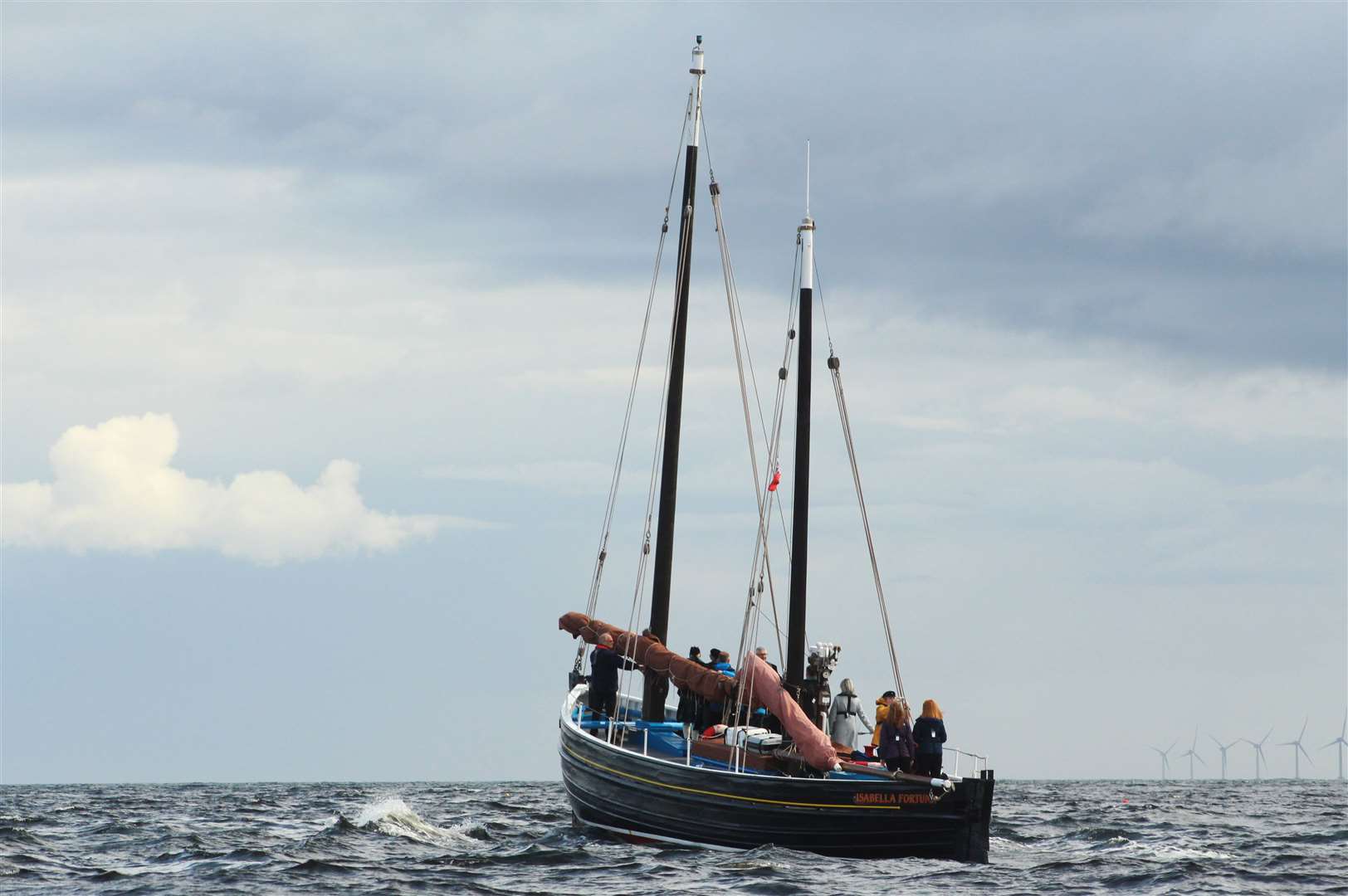 The Wick Society's Isabella Fortuna heading out to the bay for the start of the service. Picture: Alan Hendry