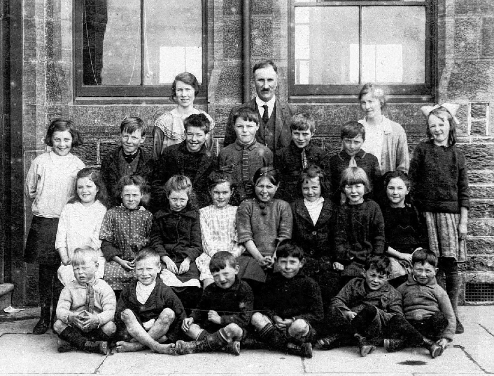 Keiss school, probably in the 1930s. The group is believed to include headmaster Mr Sutherland and teachers Miss Budge and Miss Bremner.
