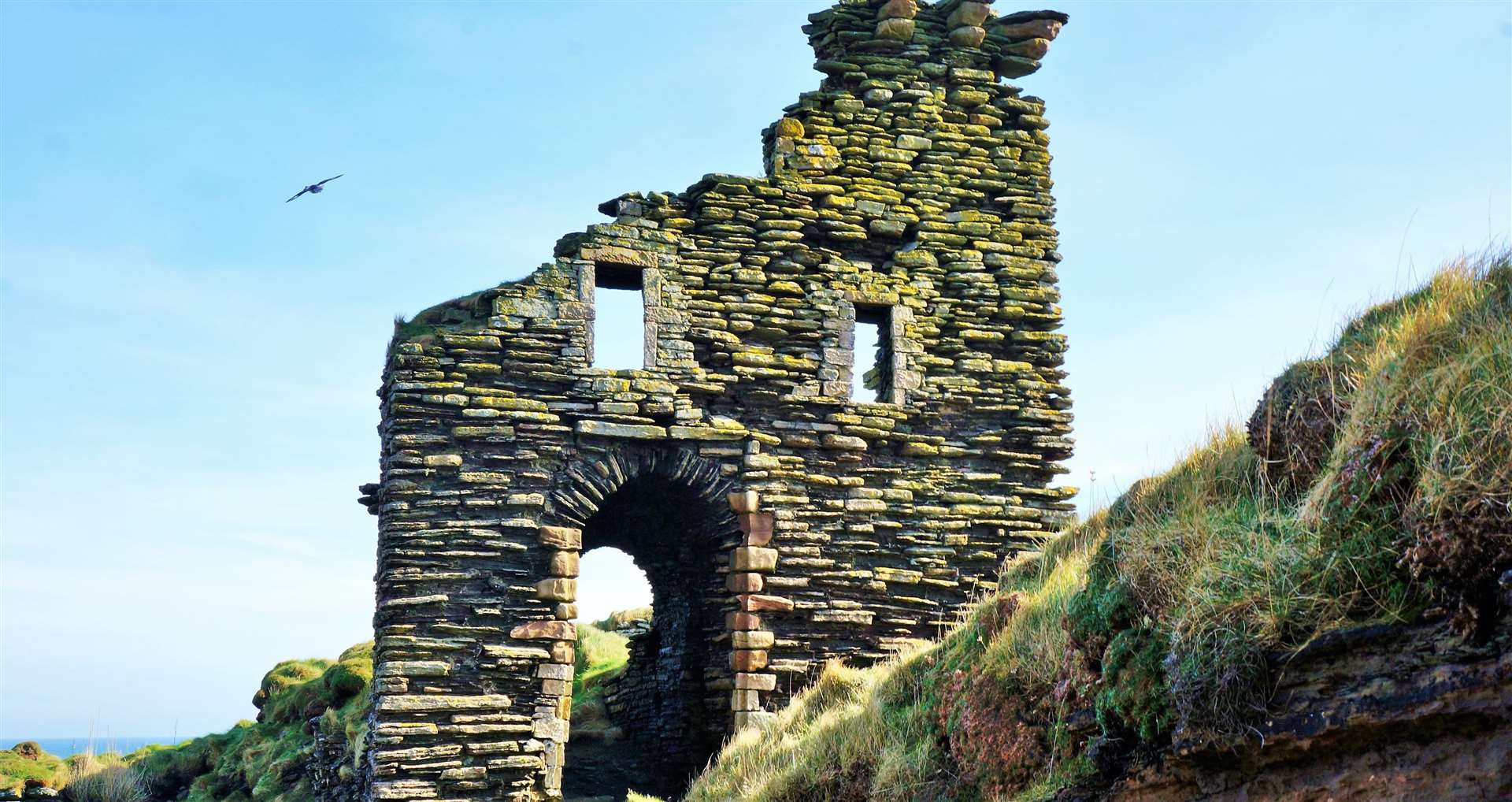 Bucholie Castle is sited on sheer cliffs near Freswick on the NC500 route. The figure could be seen climbing the steep incline over the left hand side window. Picture: DGS