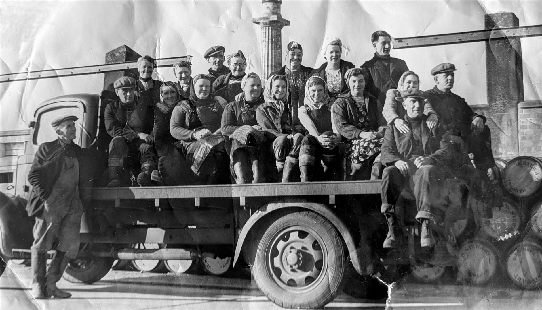 A damaged print showing the Stewarts’ fishcurers crew at Great Yarmouth around 1930, with Jessie in the back row, fourth from left (courtesy of Agnes Clark).