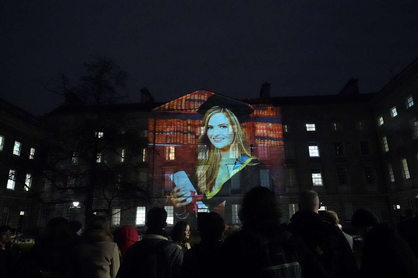 A projection of Ashling Murphy on the walls of Trinity College, Dublin (Niall Carson/PA)