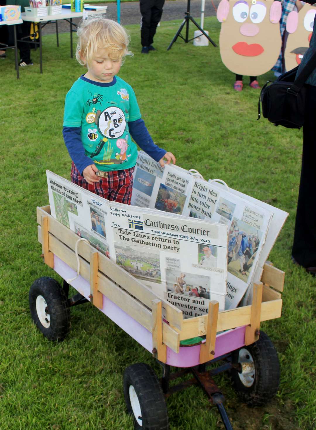 Headline news: Poppy Mackenzie (2) with a collection of Groat and Courier cuttings. Picture: Alan Hendry