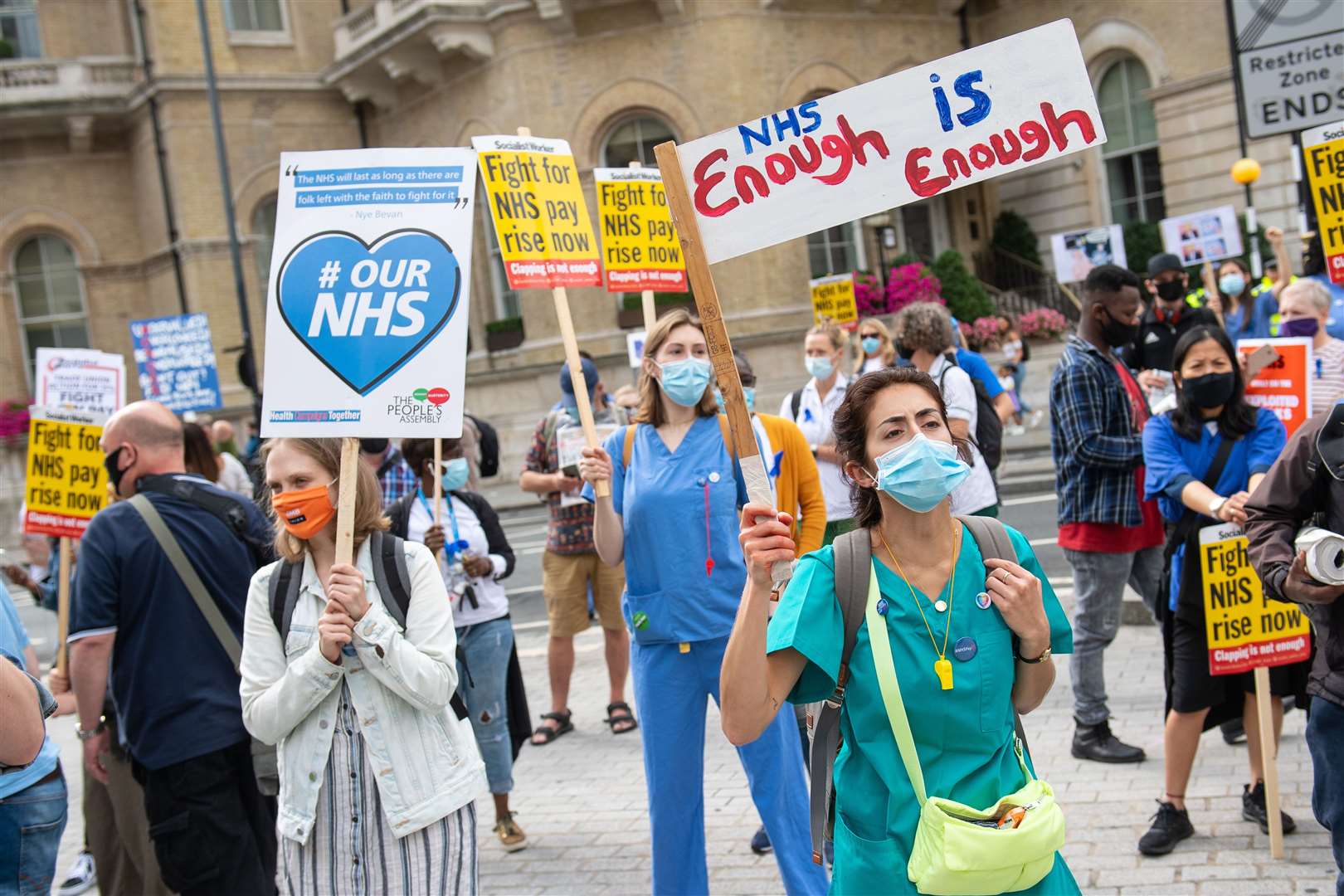 NHS staff and supporters take part in a protest march in central London (Dominic Lipinski/PA)