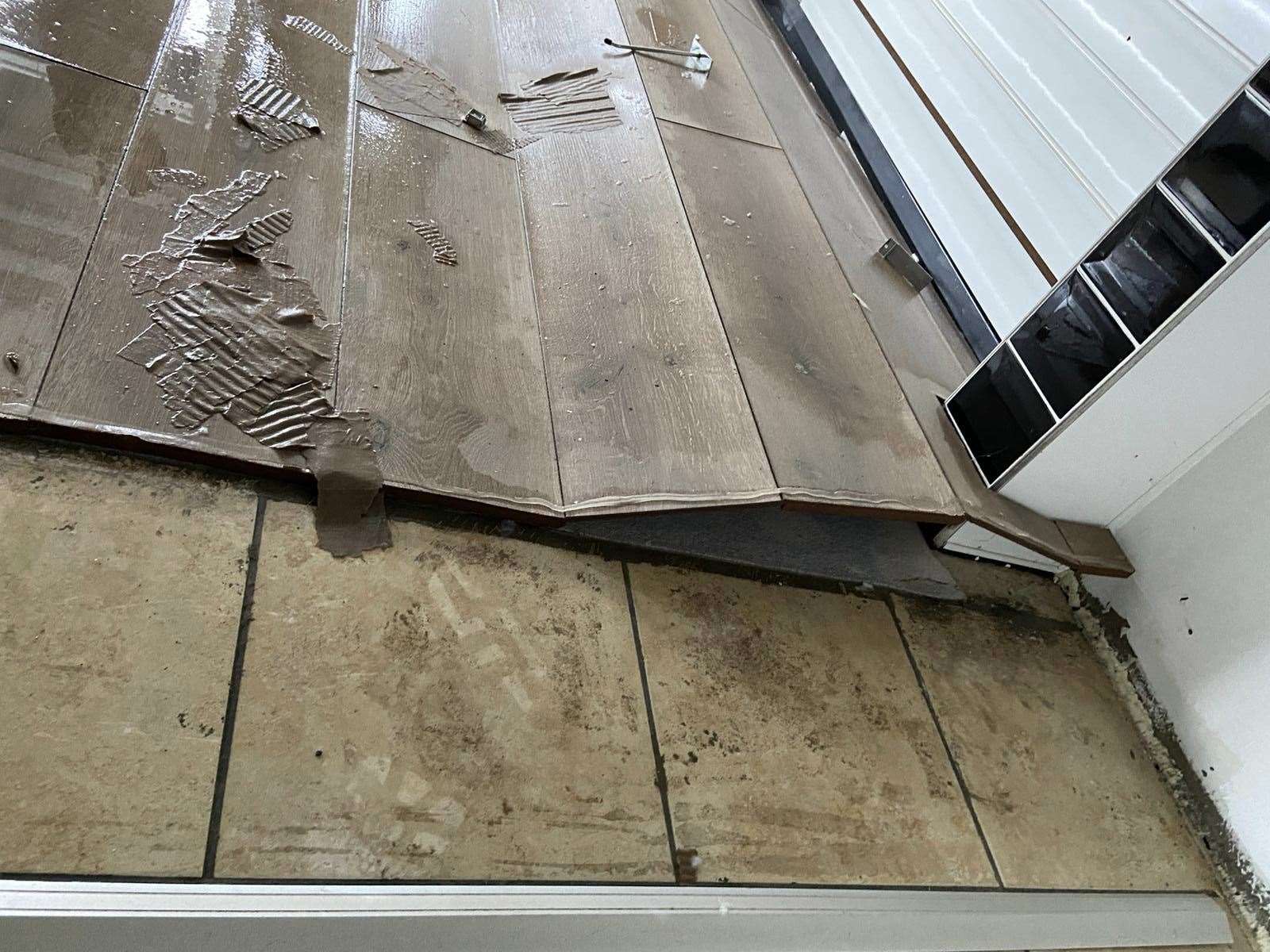 The flooring inside Ciara Douglas’ shop following the flooding (Ciara Douglas/PA)