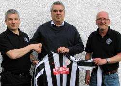 New Wick Academy manager David Kirkwood is welcomed to Harmsworth Park by chairman Colin Stewart (left) and vice-chairman Alan Shearer.