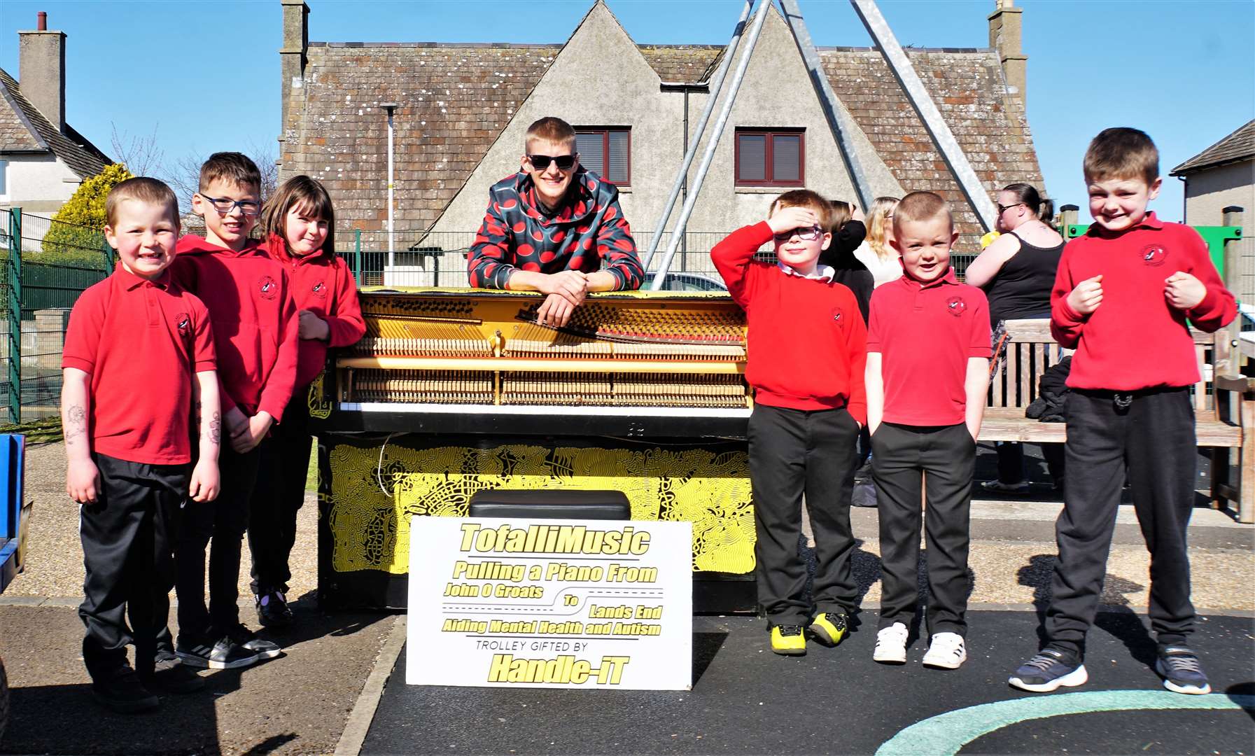 Piano James with some of the local kids at Castletown.