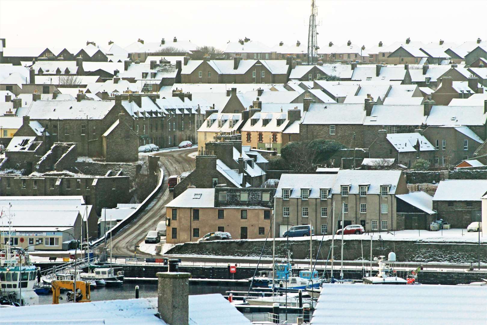 Snow covers rooftops over Pulteneytown in Wick this morning. Picture: Alan Hendry