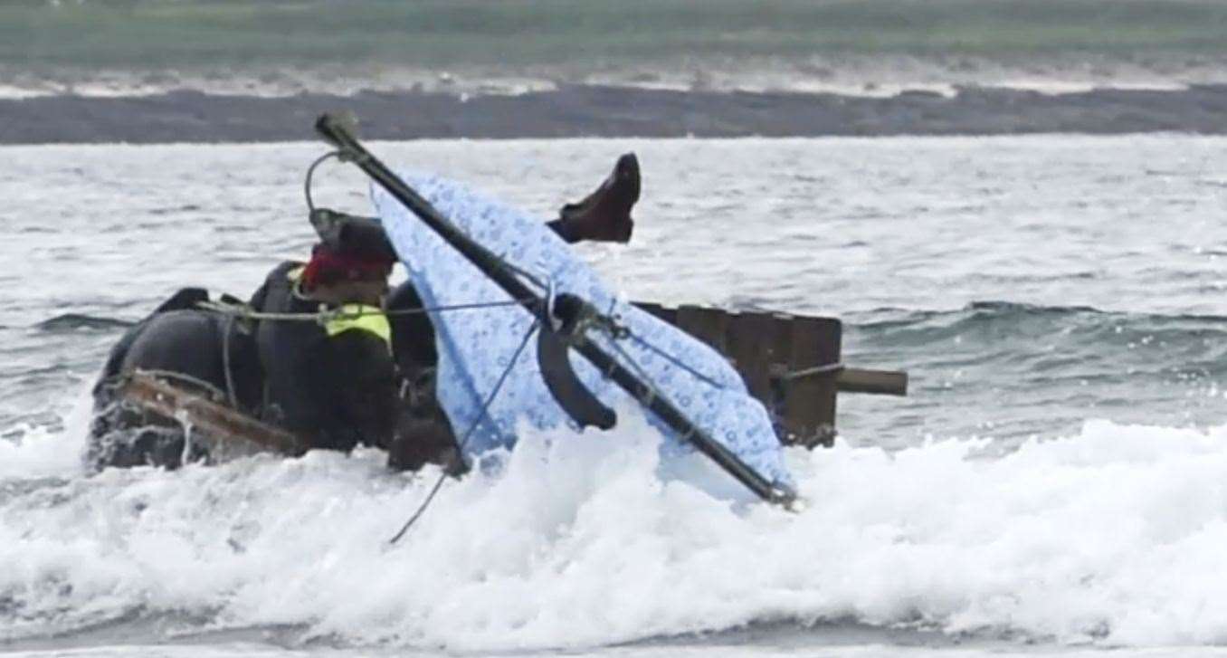 The two are toppled from their raft. Picture: ECHT