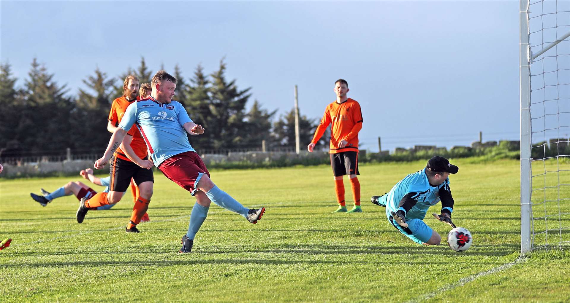 Pentland United's James Murray beats John O'Groats keeper Christy Cannop to score his side's fifth goal during their 7-1 win. Picture: James Gunn