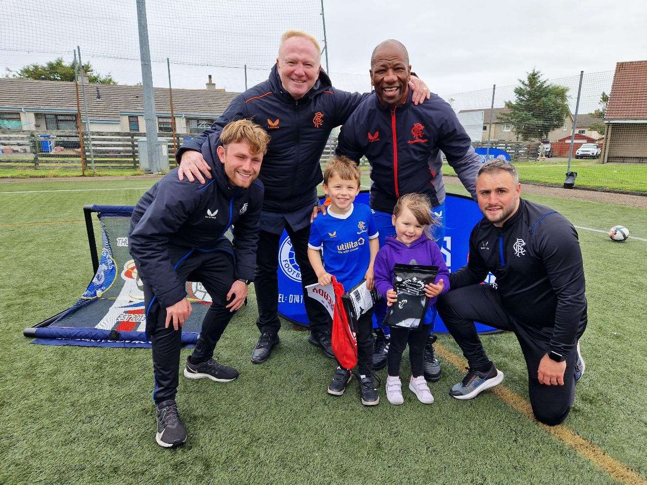 The 3-5 players of camp with Alex, Marvin and coaches from Rangers Soccer Academy.