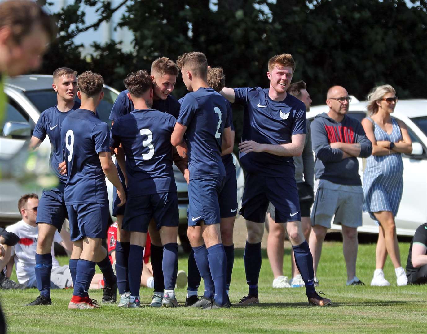 James Mackintosh (centre) is congratulated after scoring the first goal just before half-time. Picture: James Gunn