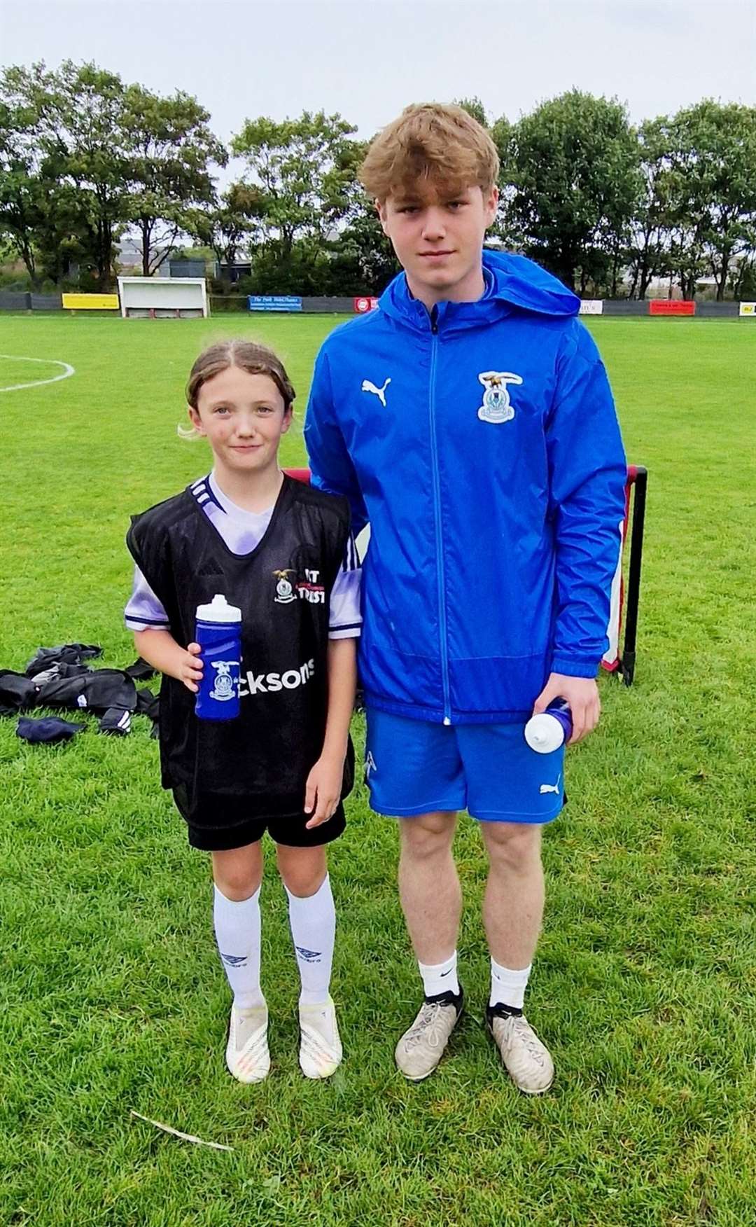 Myah Macleod with Sam Reid.