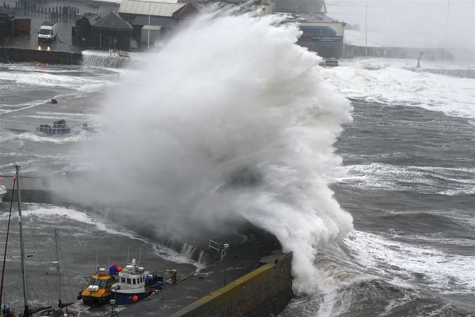 Huge waves hit the coast at Stonehaven in Aberdeenshire on Thursday afternoon (Andrew Milligan/PA)