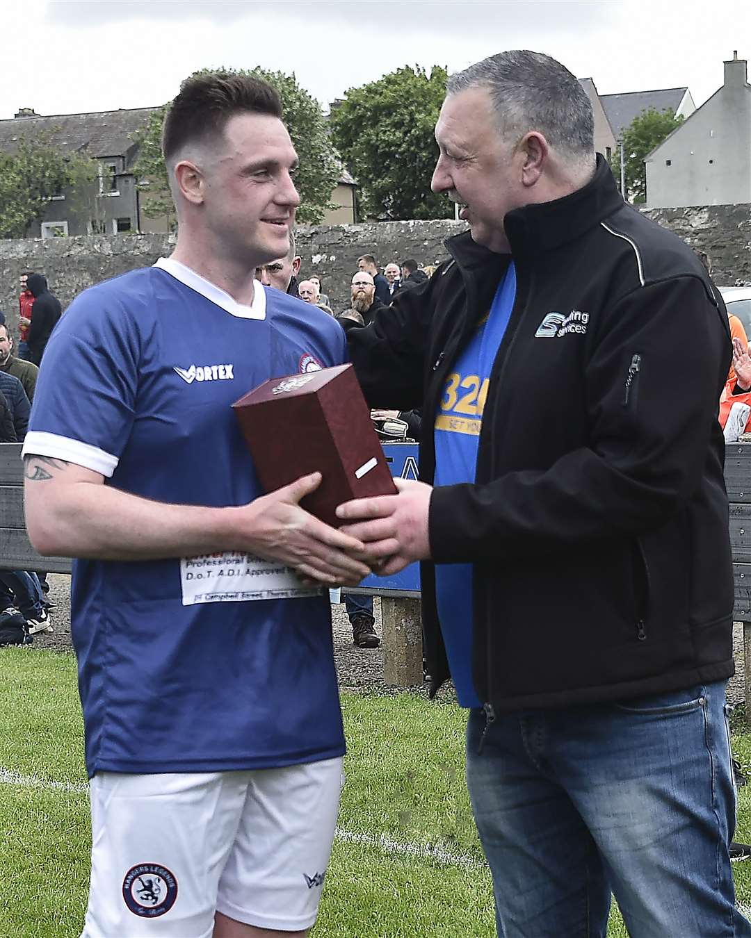 Stuart Gray receiving the Rangers Legends' man-of-the-match award from Charlie Smith of CS Drilling Services. Picture: Mel Roger