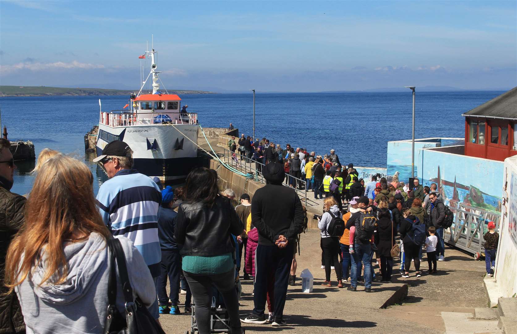 Passengers queuing for the Friday afternoon wildlife cruise on the Pentland Venture. Picture: Alan Hendry