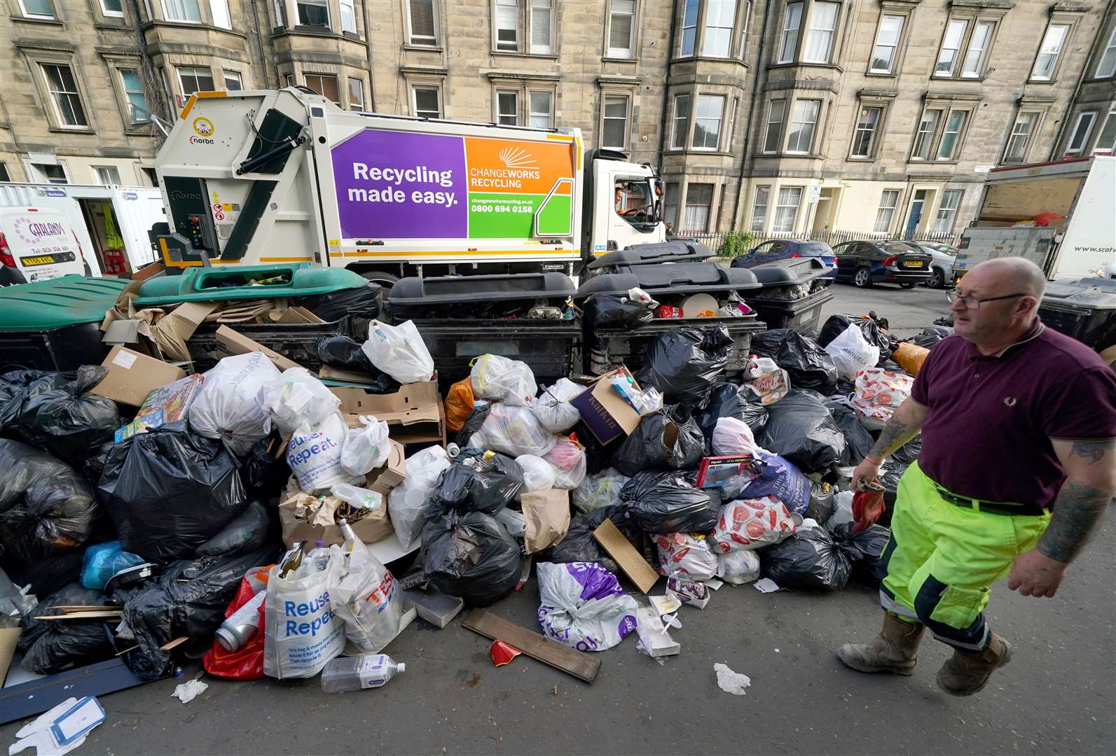 The strike action has seen rubbish overflow on to the streets of Scotland’s towns and cities (Andrew Milligan/PA)