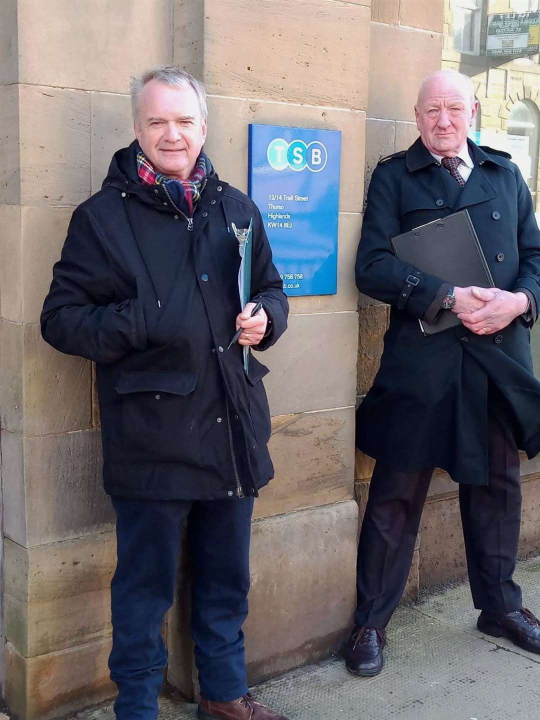 Ron Gunn (left) and Iain Gregory outside the TSB branch in Traill Street, Thurso, on Monday.