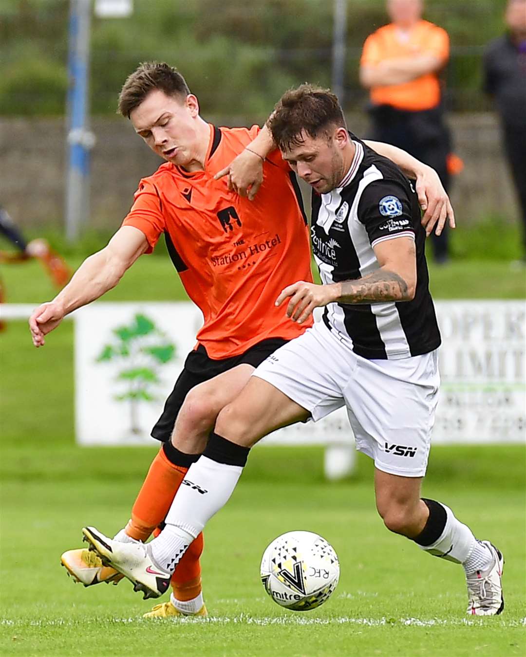 Wick Academy midfielder Jack Henry in a tussle with Craig Cormack of Rothes. Picture: Mel Roger