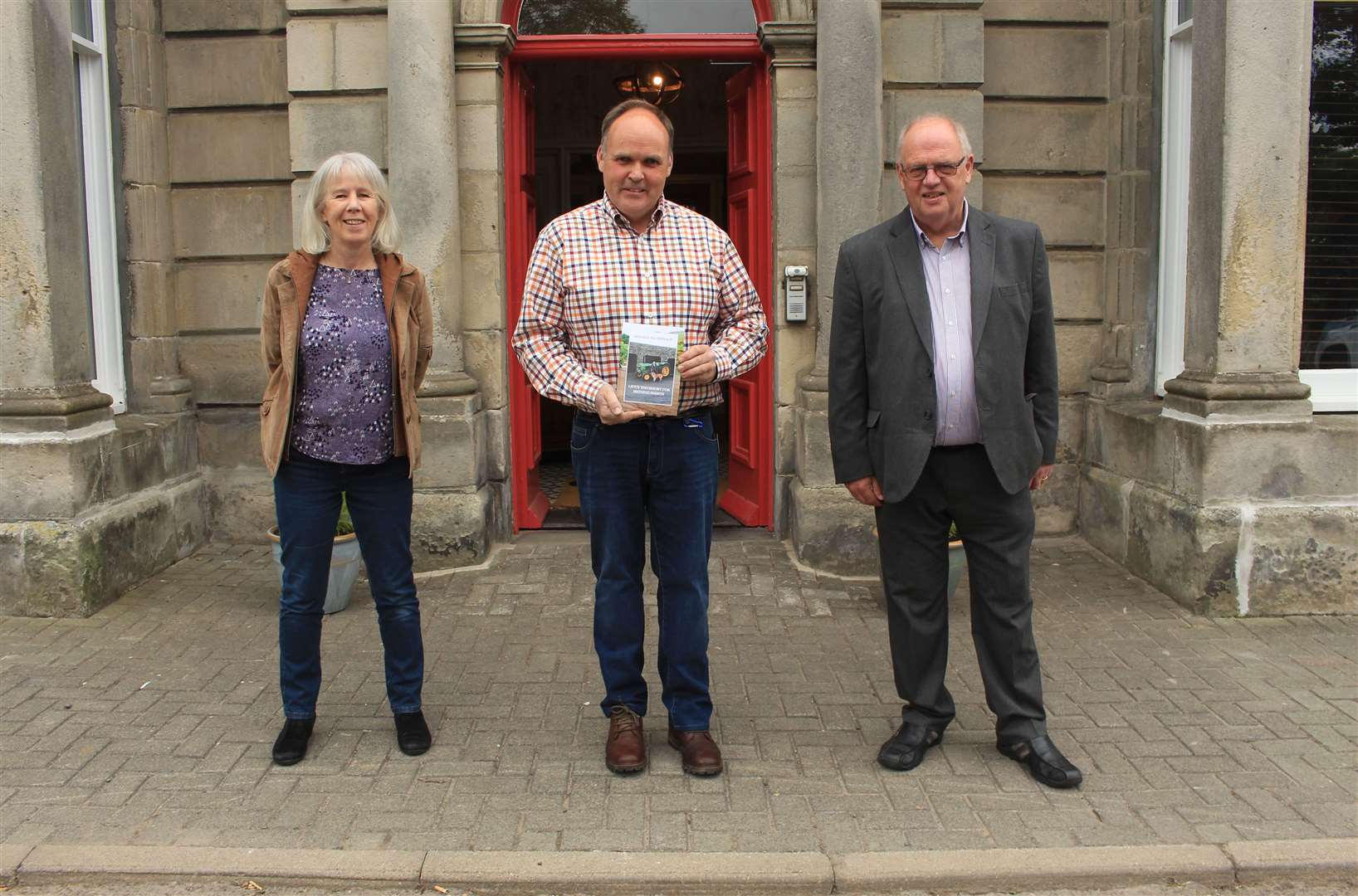 Donald MacDonald (centre) with Chris Nicolson and Ian Leith outside the Manor House hotel in Thurso where Life’s Too Short for Ironing Shirts was launched on Saturday. Picture: Alan Hendry