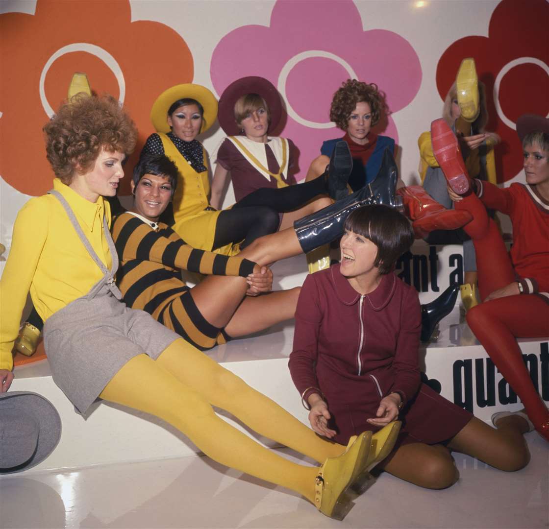 Models showing off their footwear with fashion designer Mary Quant, bottom right, in London (PA)