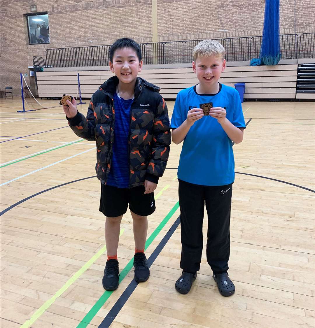 Nicholas Wong with Liam Sinclair.