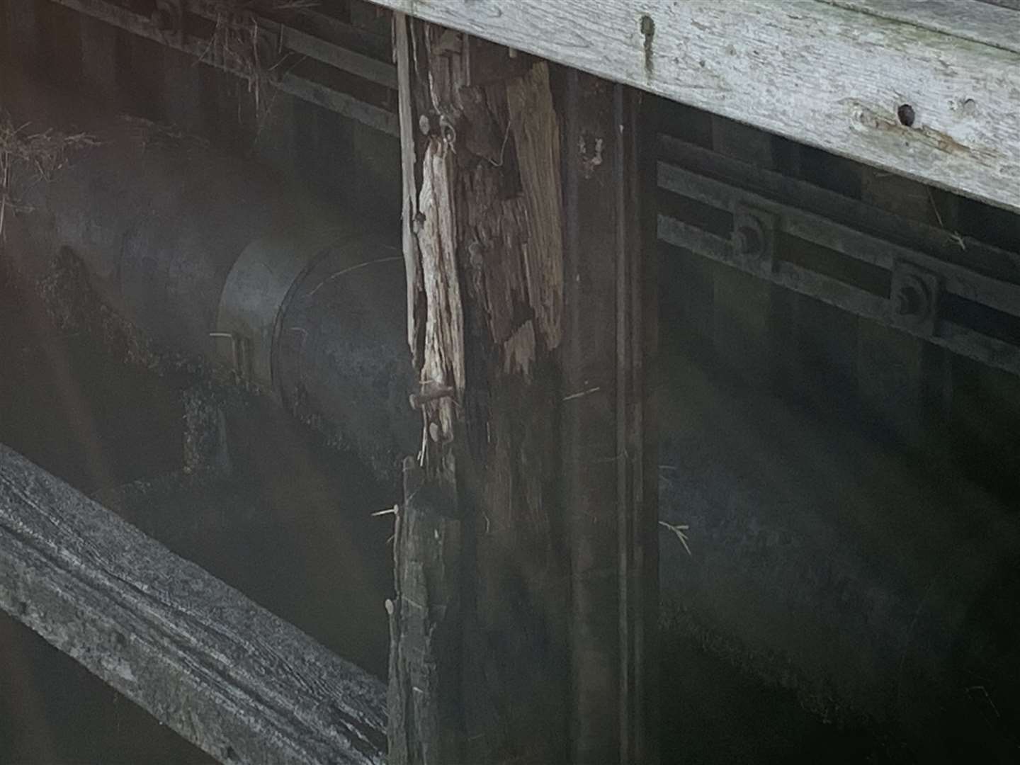 A close-up showing the deteriorating state of wooden fenders at Thurso harbour.