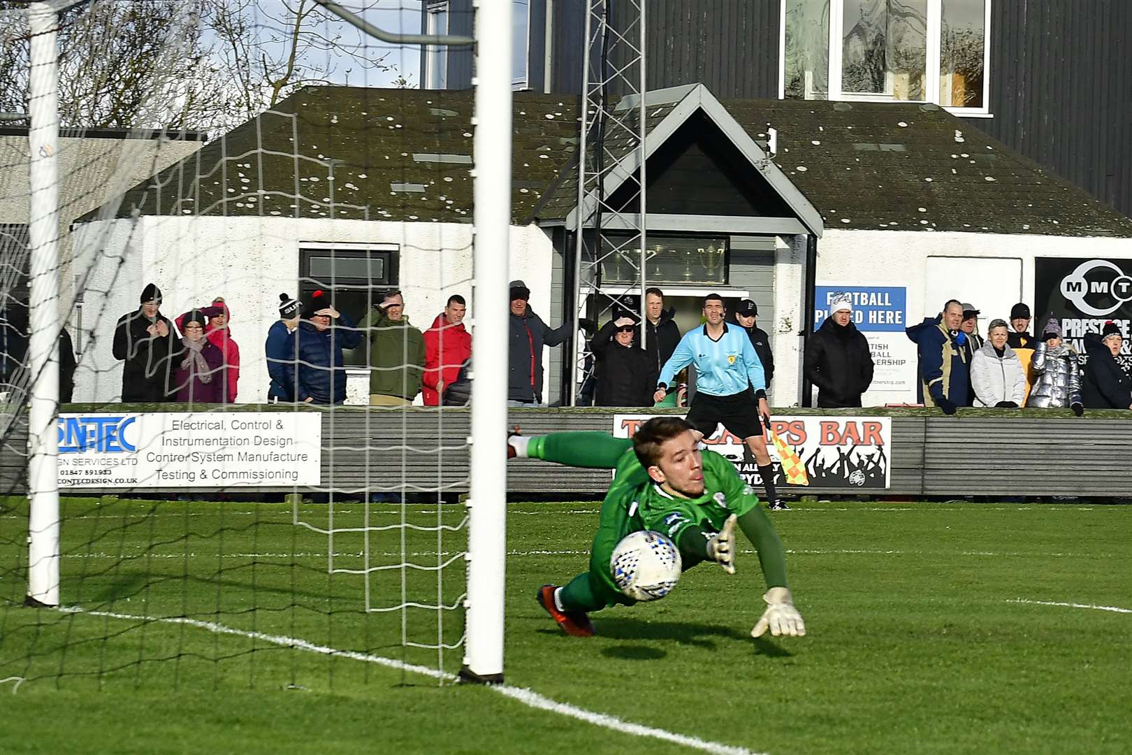 Sean McCarthy's attempt to stop Dale Gillespie's rocket from outside the box is in vain as the ball flies into the net during Wick's 1-0 home defeat to Brora. Picture: Mel Roger