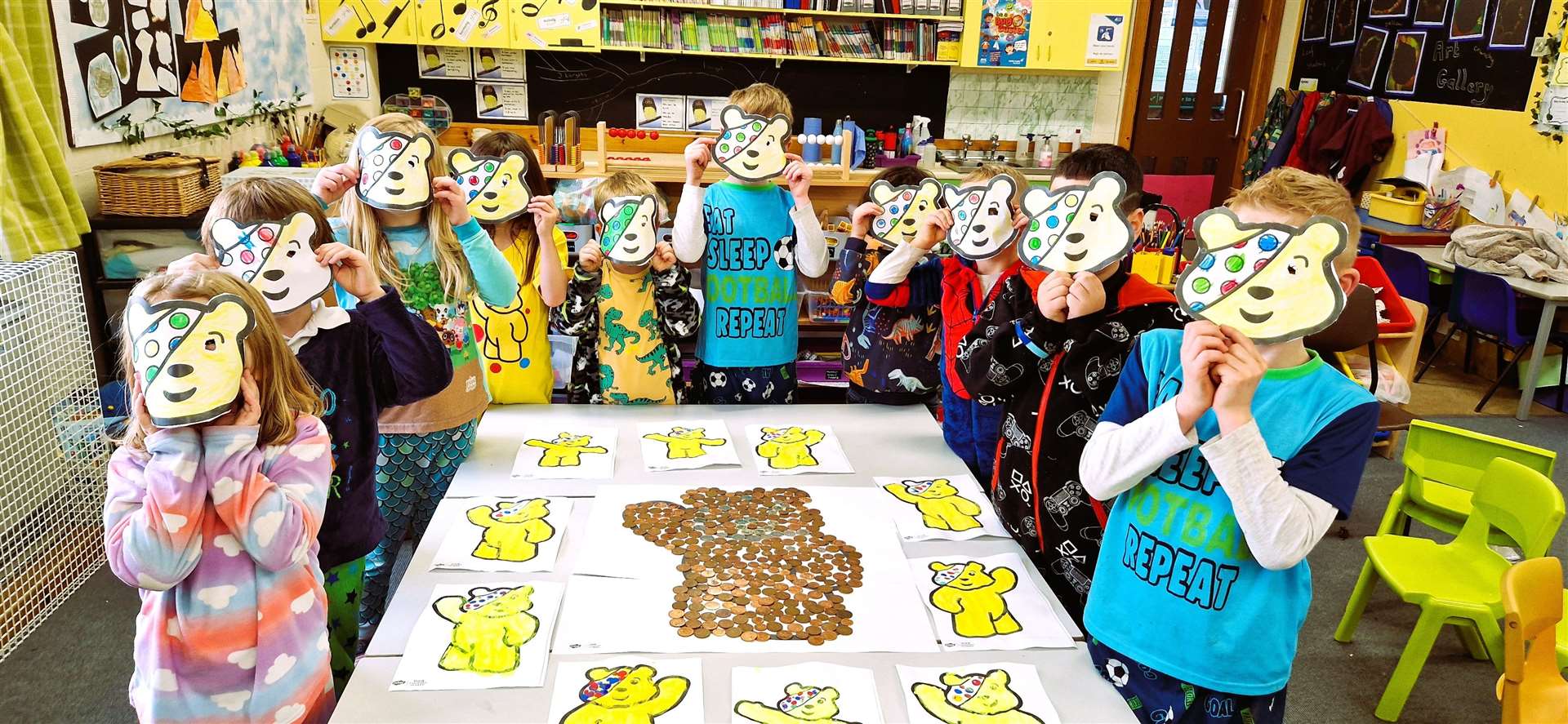 Dunbeath Primary School pupils with their Pudsey bear masks.