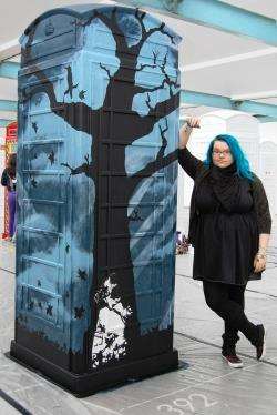 Loz Atkinson with her telephone box – The Thing with Feathers.